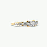 V569 - Taper Ring Of Emerald Stones