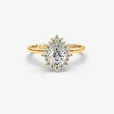 V638 - Tapered Halo Ring Of Pear & Round Stones