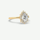 V638 - Tapered Halo Ring Of Pear & Round Stones