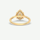 V638 - Tapered Halo Ring Of Pear & Round Stones